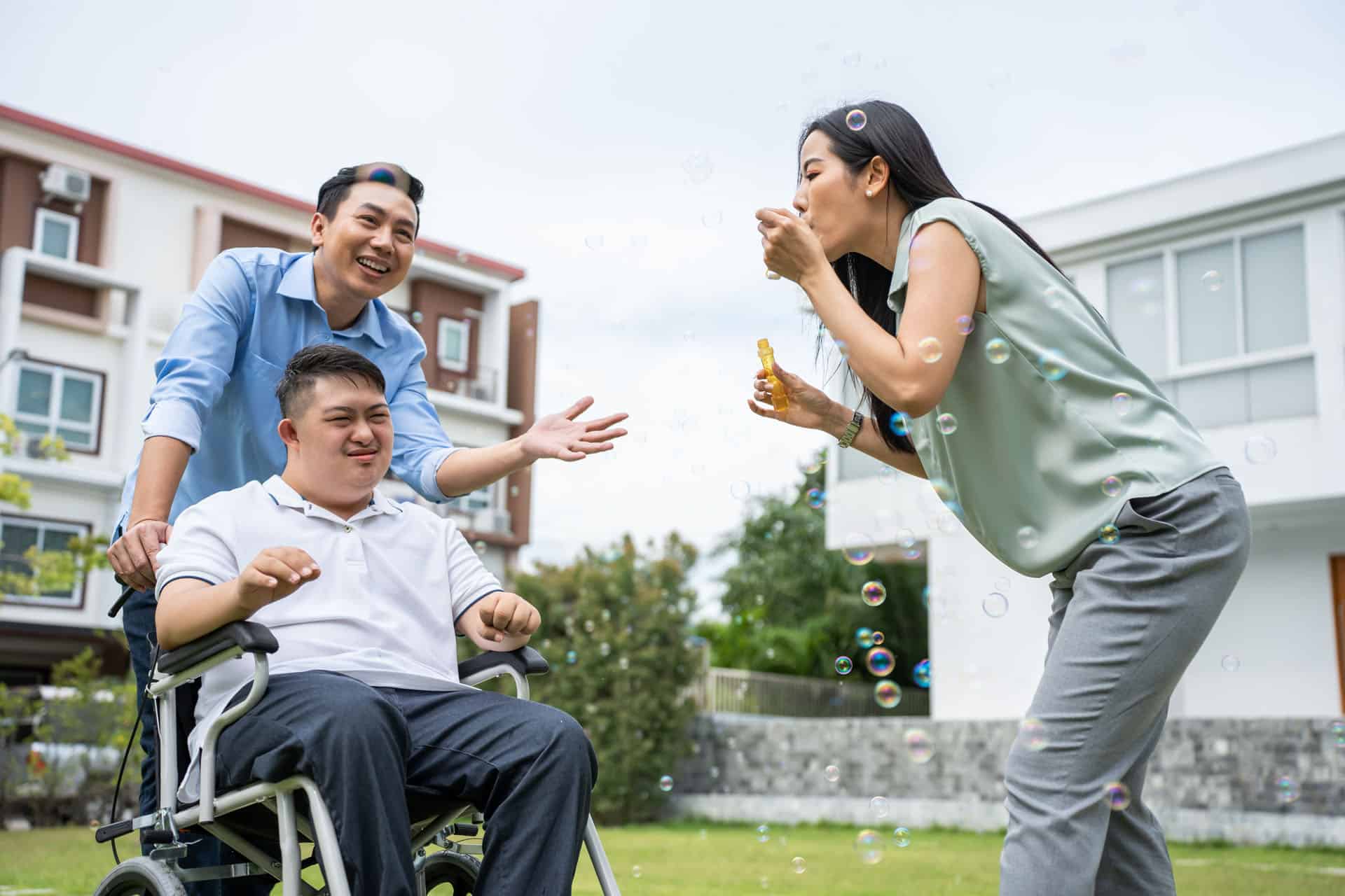 Caregiver supporting an individual in a residential care setting.