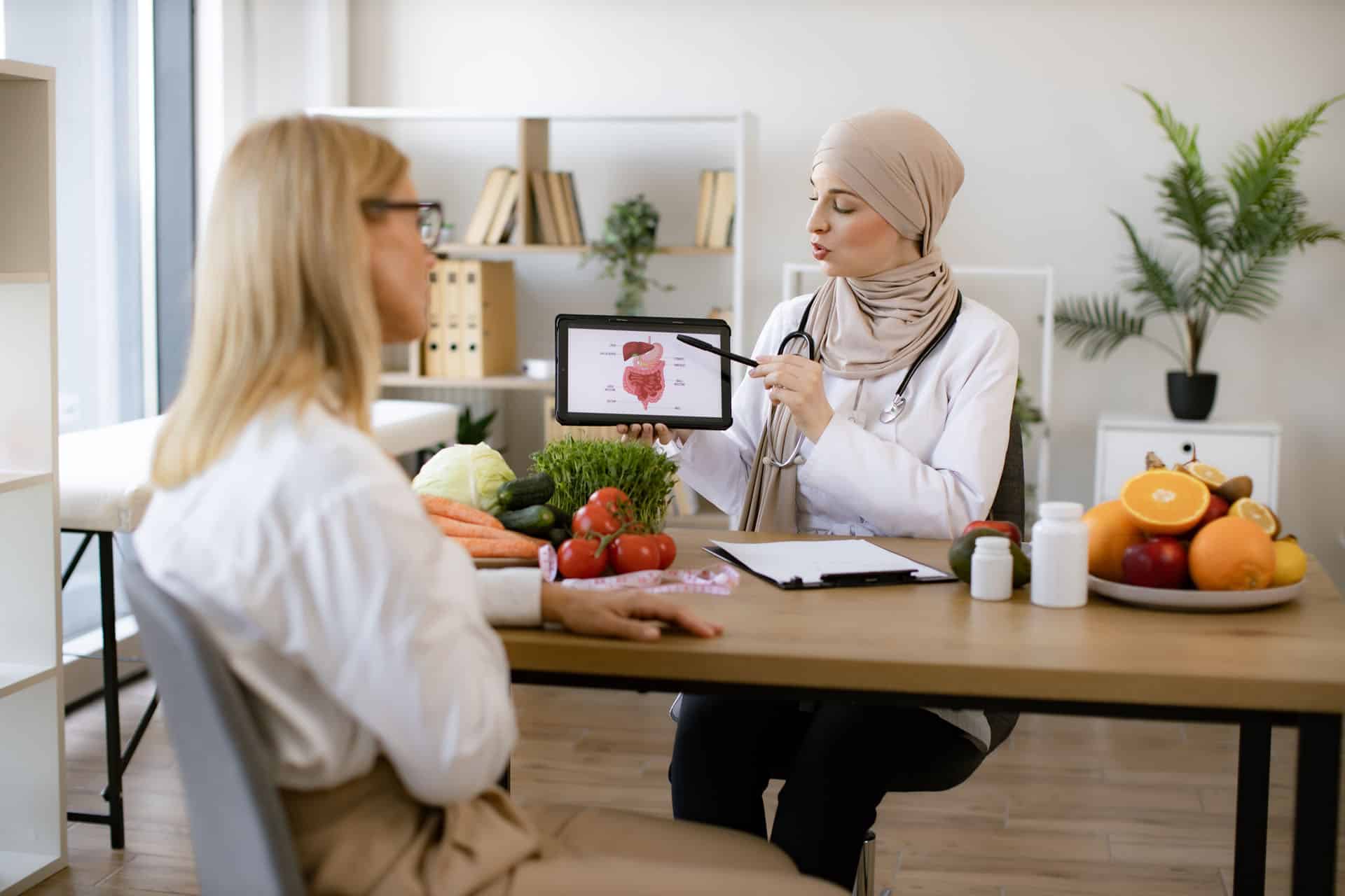 Clinician providing a nutrition consultation to an adult patient in New Jersey.